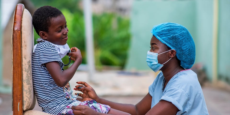 nurse-plays-with-child